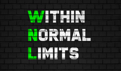 Within normal limits(WNL) concept,healthcare abbreviations on black wall
