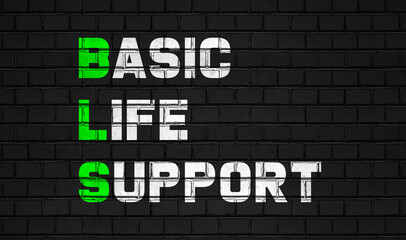 Basic life support(BLS) concept,healthcare abbreviations on black wall - obrazy, fototapety, plakaty