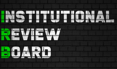institutional review board(IRB) concept,healthcare abbreviations on black wall