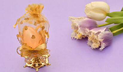 Gift Easter egg and spring flowers tulips 
