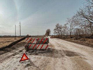 12.03.2022 Irpin, Ukraine: self-made checkpoint at the entrance to the village to check cars and...