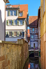 City of Tübingen. Idyllic side alley with small watercourse, Black forest, Germany