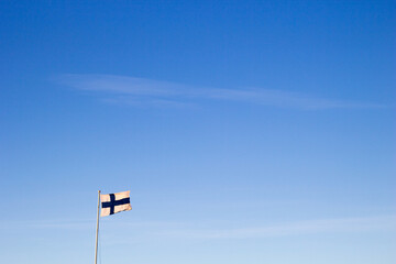 flag of finland against a blue sky