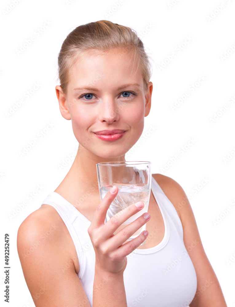 Wall mural The healthy hydration option. Portrait of a beautiful young woman with a glass of water isolated on white.