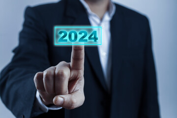 man hand touching on 2024 calender year button