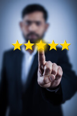 man pointing finger on feedback rating star symbol