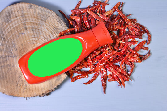 https://submit.shutterstock.com/pending?type=photo#:~:text=Red%20ketchup%20box%20and%20scattered%20red%20chile%20peppers%20on%20wooden%20background
