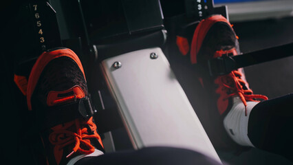 Fit Athletic Baby Woman Work out on Rowing Machine, Doing Her Fitness Exercise. Girl Activity Training in Modern Gym. Sports Female Workout in Exercising on Row Machine Fitness Center.