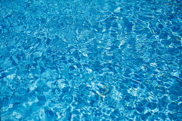 Blue deep pool with chlorinated water, outdoor swimming pool
