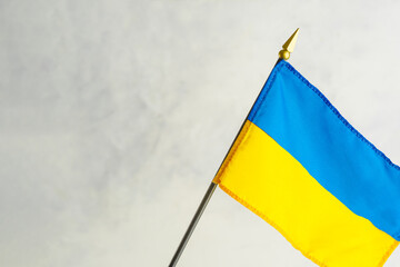 National flag of Ukraine on a white background. There are no people in the photo. There is free space to insert. Support for Ukraine in the war with aggressive Russia.