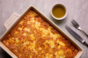Kalinte meal bake from chickpea flour and eggs with feta cheese and olive oil.