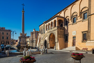 Tarquinia, Viterbo, Lazio, Italy - The main square of the village. The circular fountain with the...