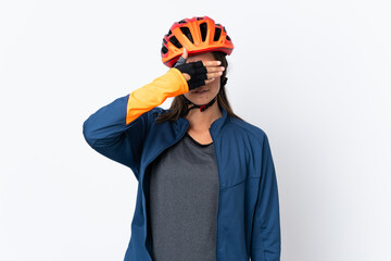 Young cyclist brazilian girl isolated on white  background covering eyes by hands. Do not want to see something