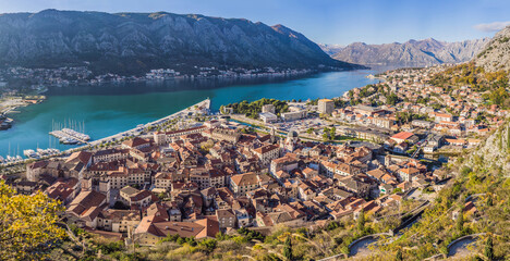 Fototapeta premium Old city. Kotor. Montenegro. Narrow streets and old houses of Kotor at sunset. View of Kotor from the city wall. View from above