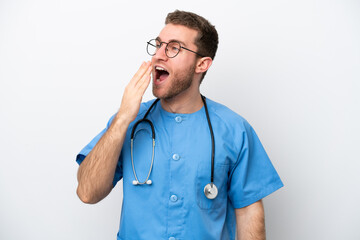 Young surgeon doctor caucasian man isolated on white background yawning and covering wide open mouth with hand