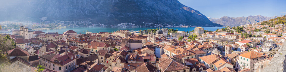 Naklejka na ściany i meble Old city. Kotor. Montenegro. Narrow streets and old houses of Kotor at sunset. View of Kotor from the city wall. View from above