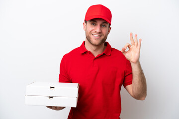 Pizza delivery caucasian man with work uniform picking up pizza boxes isolated on white background showing ok sign with fingers