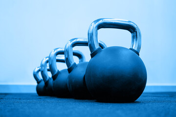 Obraz na płótnie Canvas Sports kettlebells in sport club. Weight Training Equipment