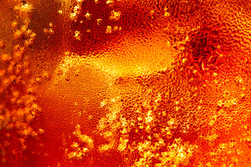 Fototapeta na wymiar Detail of Cold Bubbly Carbonated Soft Drink with Ice