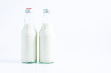 white milk bottle,Traditional glass milk bottle isolated on white,Collection of packaging for dairy products, plastic and glass bottles for milk and yogurt isolated on white background