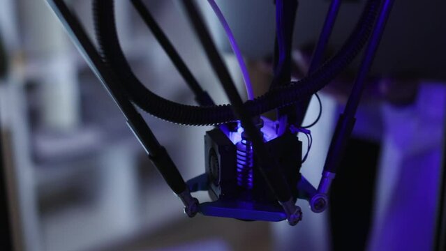 3D printer. Close-up of advanced three-dimensional printing device producing new products. Fuse deposition modeling. Additive technology.