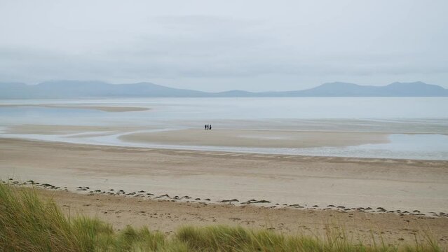 North Wales Isle Of Anglesey Snowdonia Beach At Winter People Walking 2