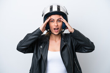 Young caucasian woman with a motorcycle helmet isolated on white background with surprise expression