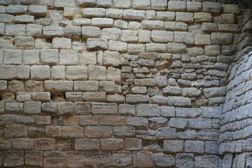 Obraz premium texture of old wall built of stone blocks. historical load.
