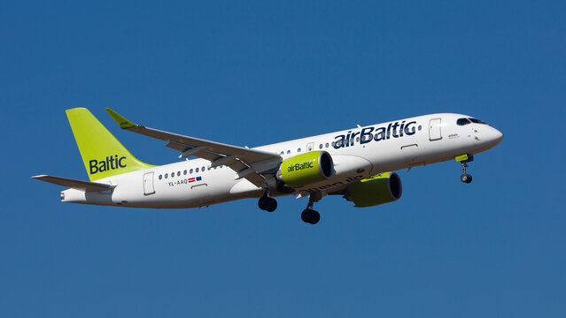 airBaltic Airbus A220-300 (formerly Bombardier C-Series CS300) on final approach against blue sky. Photographed March 2022, while this aircraft was operating in wet lease for Eurowings (Lufthansa Grou