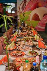 Slicing different types of meat. Meat snacks on the table. wedding buffet. Catering