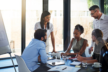 Everybody has something to add in this meeting. Shot of a group of businesspeople having a meeting...