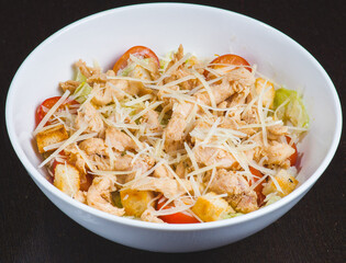 Salad with chicken meat. Fresh vegetable salad with chicken breast. Meat salad with chicken fillet and fresh vegetables on plate