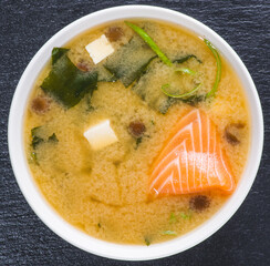 cream soup with salmon in a deep plate