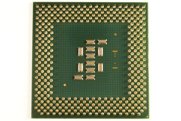 CPU. An old processor of 2001 release P III-800 on a white background. Focus in the foreground....