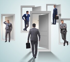 Businessman in uncertainty concept with many doors