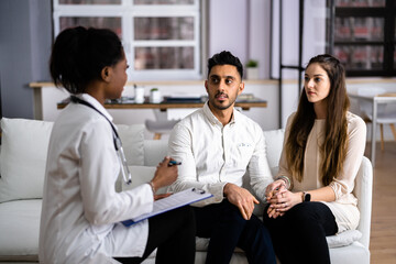Pregnant Couple And Medical Doctor