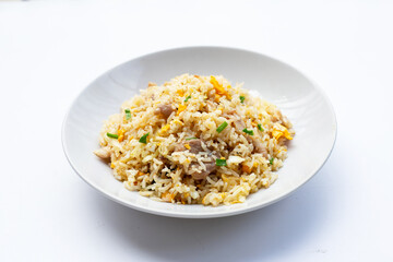 Fried rice in white plate on white background.