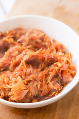 Sour cabbage with tomato sauce, hot, bowl, healthy diet, suitable for vegans and vegetarians