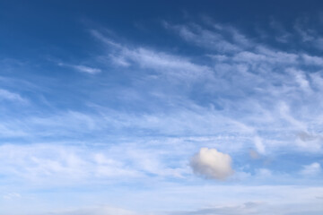 Stunning cirrus cloud formation panorama in a deep blue sky