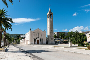 Obraz premium church in Ploce in Croatia, center of the city Ploce, promenade in Ploce, summer cityscape, blue and cloudy sky