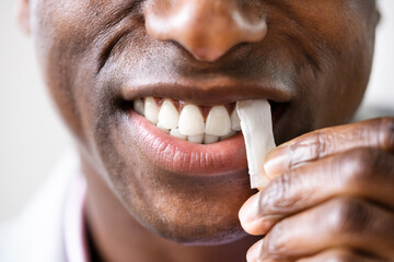 Man Chewing Wet Moist Nicotine Tobacco Snus