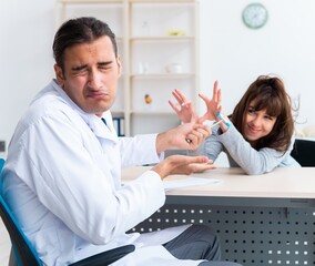 Mentally ill woman patient during doctor visit