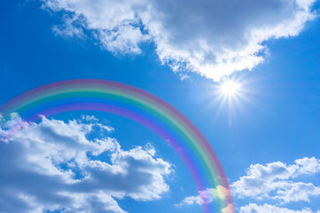 Bright blue sky with rainbow and sunshine_blue_10