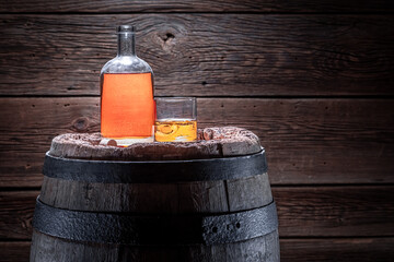 Hand crafted brendy with ice in an old distillery.