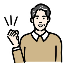 笑顔でガッツポーズをしている中年男性
