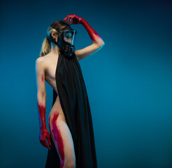 the naked girl with a gas mask and bloody hands