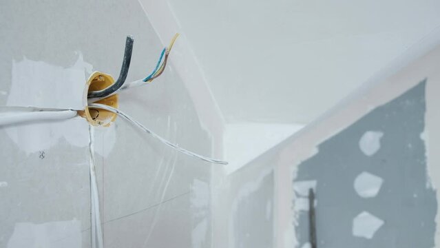 wires sticking out of the wall. electrical wiring repair