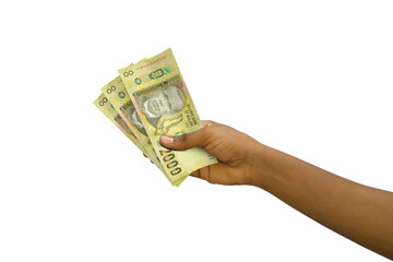 Fair hand holding 3D rendered 2000 Malawian kwacha notes isolated on white background