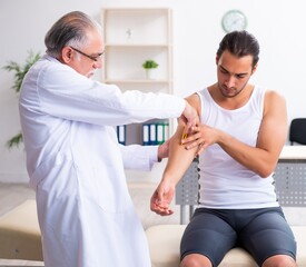 Young male patient visiting experienced doctor