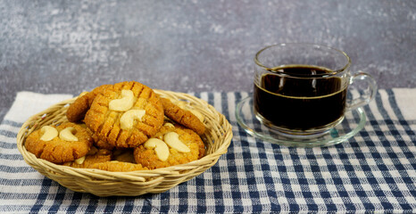 cookies with cashew nuts on the wooden basket,Keto cookies with hot black coffee, ketogenic diet